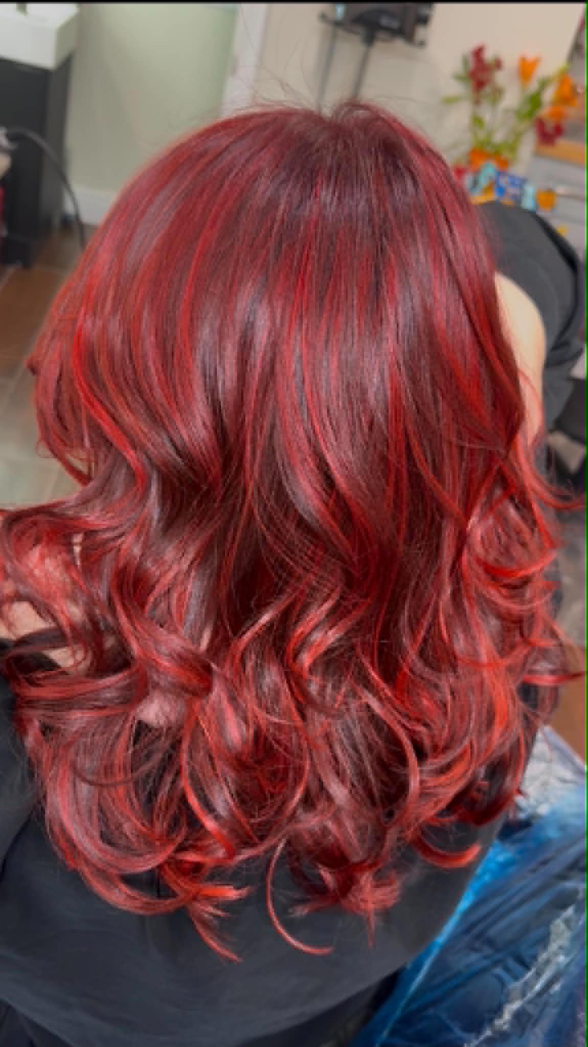 Vivid red hair color Orlando salon